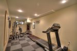 Gym with Exercise Equipment and TV